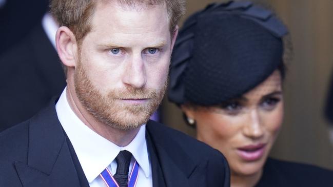 LONDON, ENGLAND - SEPTEMBER 14: Prince Harry and Meghan, Duchess of Sussex leave Westminster Hall, London after the coffin of Queen Elizabeth II was brought to the hall to lie in state ahead of her funeral on Monday on September 14, 2022 in London, England. Queen Elizabeth II's coffin is taken in procession on a Gun Carriage of The King's Troop Royal Horse Artillery from Buckingham Palace to Westminster Hall where she will lay in state until the early morning of her funeral. Queen Elizabeth II died at Balmoral Castle in Scotland on September 8, 2022, and is succeeded by her eldest son, King Charles III. (Photo Danny Lawson - WPA Pool/Getty Images)