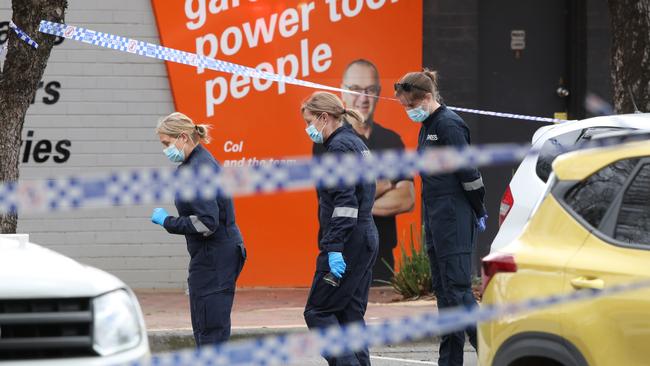 Forensic police at the scene. Picture: David Crosling