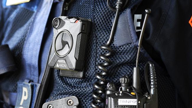 A police officer wearing a body camera. Picture: Justin Kennedy