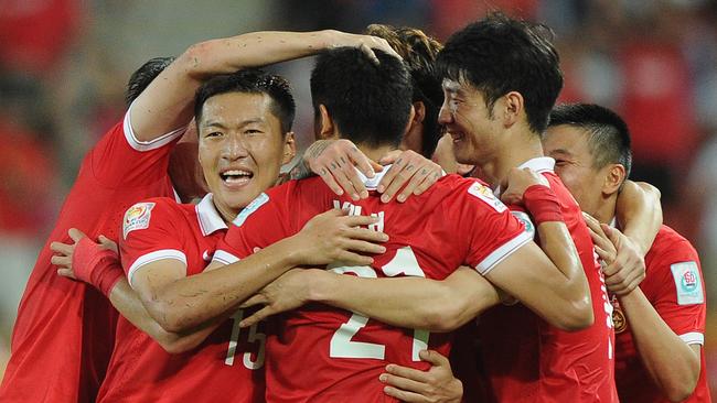 BRISBANE, AUSTRALIA - JANUARY 10: Yu Hai of China PR (#21) celebrates scoring a goal ith team mates during the 2015 Asian Cup match between Saudi Arabia and China PR at Suncorp Stadium on January 10, 2015 in Brisbane, Australia. (Photo by Matt Roberts/Getty Images)