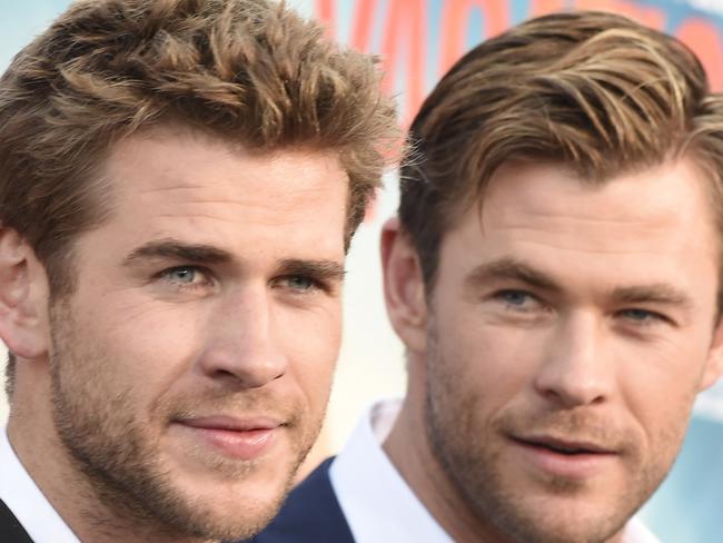 Liam Hemsworth (left) and Chris Hemsworth. Picture: AFP