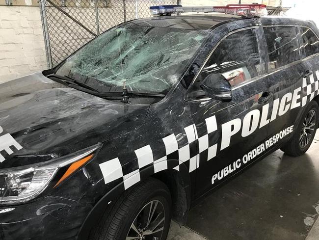 Police cars were smashed at an out-of-control party in North Melbourne. Picture: Paul Dowsley