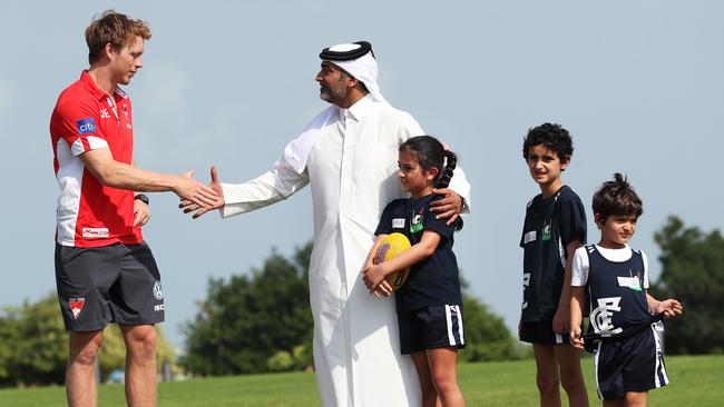 Callum Mills meets Eisan Ahmed Abdulla and his children Dana, Khalifa and Nasser who play for the Doha Kangaroos. Picture: Phil Hillyard