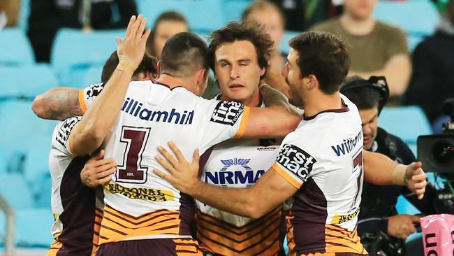 Lachlan Maranta celebrates a try with his Broncos teammates. Picture: Mark Evans