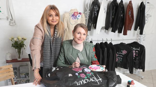 Efthimia Devaney and artist Sharon Hindle with some of the Hide and Rose designed jackets. Photo by Richard Gosling