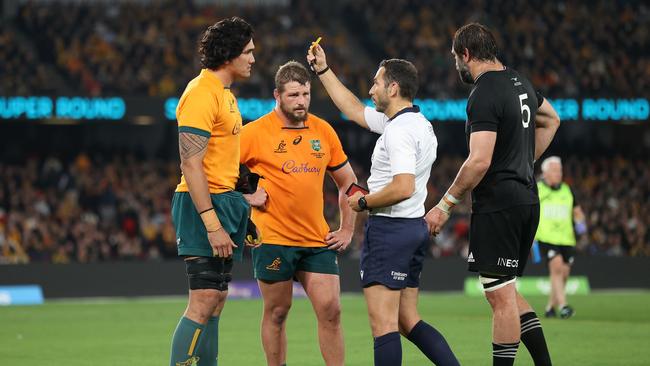 Darcy Swain receives a yellow card from referee Mathieu Raynal. Picture: Getty Images