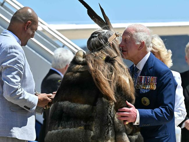 Ngunnawal Elder Aunty Serena Williams welcomed the monarch with a kiss. Picture: Saeed Khan/Pool/AFP