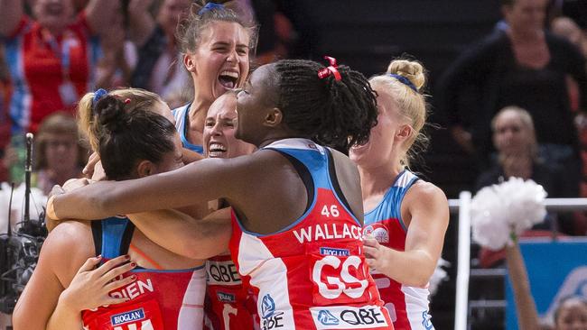 NSW Swifts celebrate their epic win.