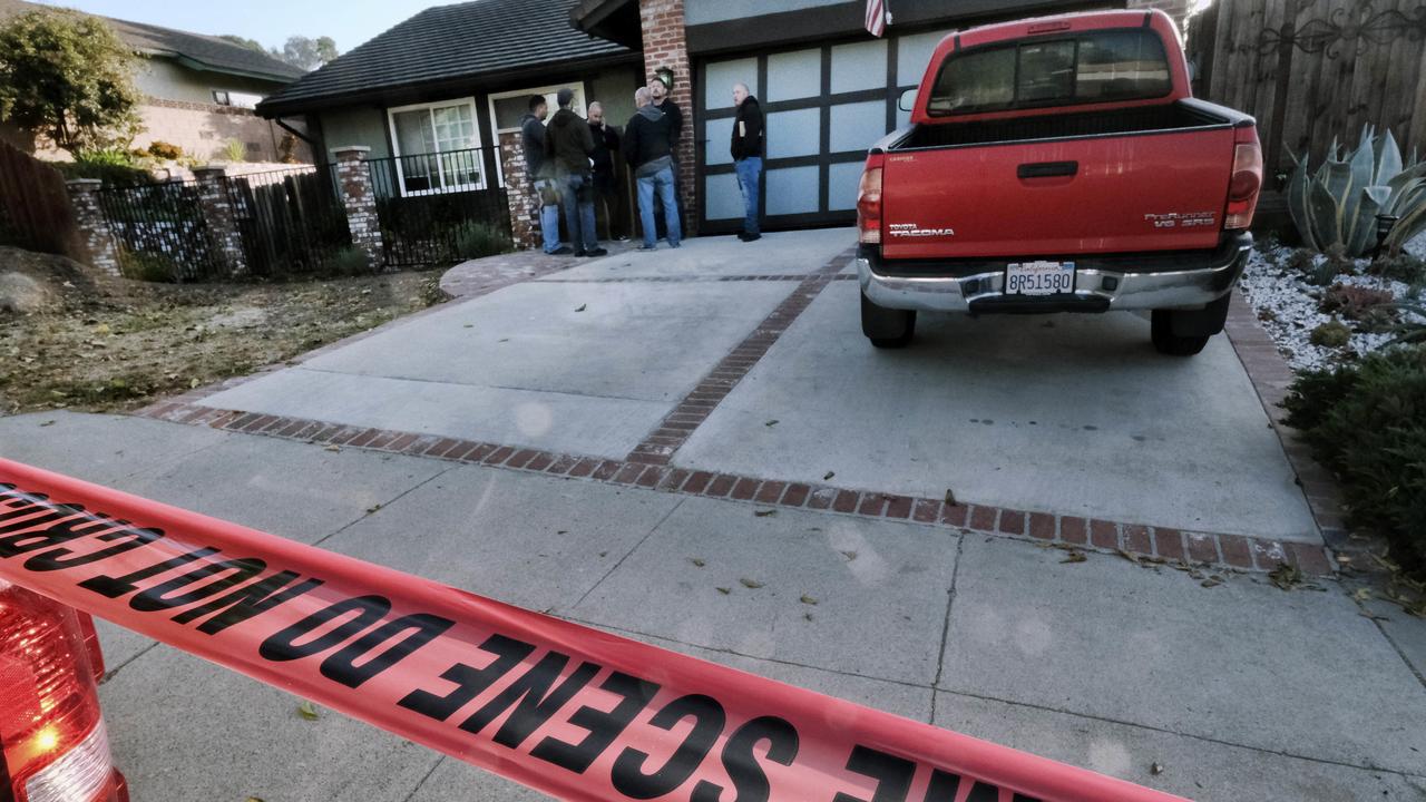 Ventura County Sheriff's deputies stand outside the house of shooting suspect David Ian Long in Newbury Park, California. Picture: AP