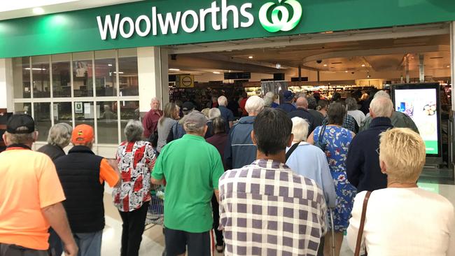 RUSH HOUR: A crowd of pensioners lined up at the door at Kingaroy Woolworths for their dedicated shopping hour between 7am to 8am on Wednesday morning. (Photo: Jessica McGrath)