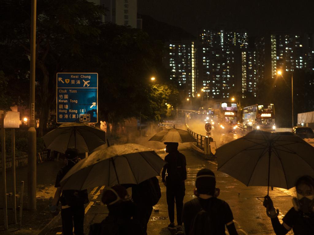 Protesters face police tear gas in Hong Kong. Picture: AP