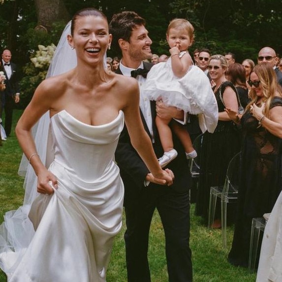 Georgia Folwer, wearing Vivienne Westwood at her wedding to Nathan Dalah. Picture: Rob Tennent
