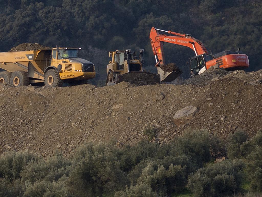 Rescue workers continue efforts to find the boy. Picture: AFP