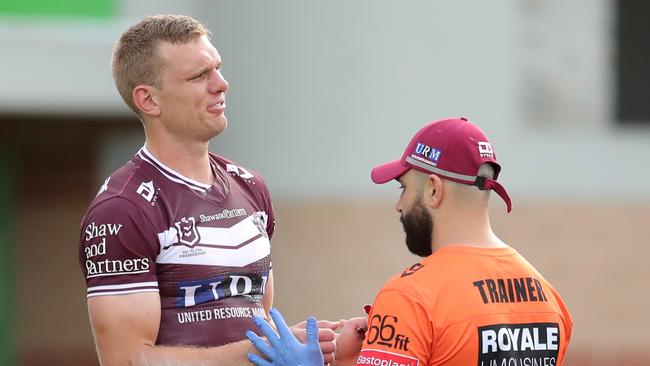 SYDNEY, AUSTRALIA – SEPTEMBER 19: Tom Trbojevic of the Sea Eagles is seen by medical staff during the round 19 NRL match between the Manly Sea Eagles and the Gold Coast Titans at Lottoland on September 19, 2020 in Sydney, Australia. (Photo by Matt King/Getty Images)