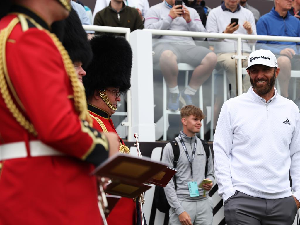 Dustin Johnson and the redcoats. Picture: Matthew Lewis/Getty Images
