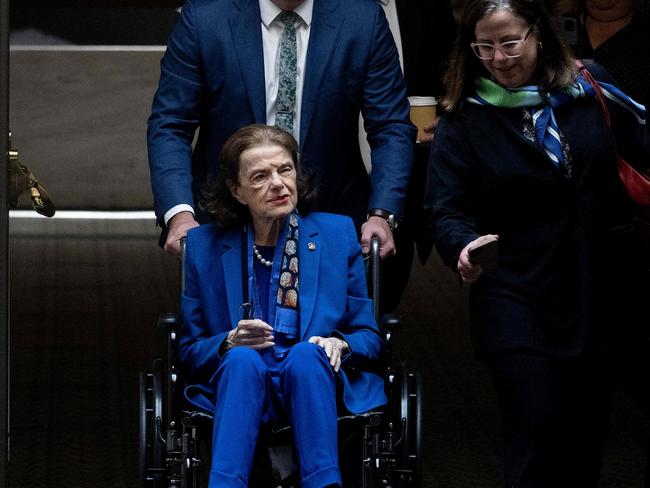 US Senator Dianne Feinstein is pushed in a wheelchair as she arrives for a Senate Judiciary Committee meeting on Capitol Hill. Picture: AFP