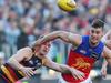 ADELAIDE, AUSTRALIA - MAY 12: Rory Laird of the Crows tackles Josh Dunkley of the Lions during the 2024 AFL Round 09 match between the Adelaide Crows and the Brisbane Lions at Adelaide Oval on May 12, 2024 in Adelaide, Australia. (Photo by James Elsby/AFL Photos via Getty Images)