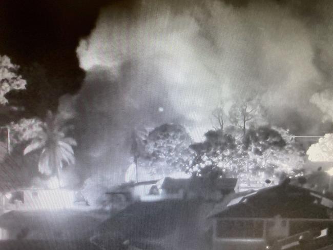 Houses burn during riots in Aurukun on January 1. Simmering clan tensions, fuelled by black market alcohol, erupted after the alleged murder of Austin Woolla. Picture: Supplied