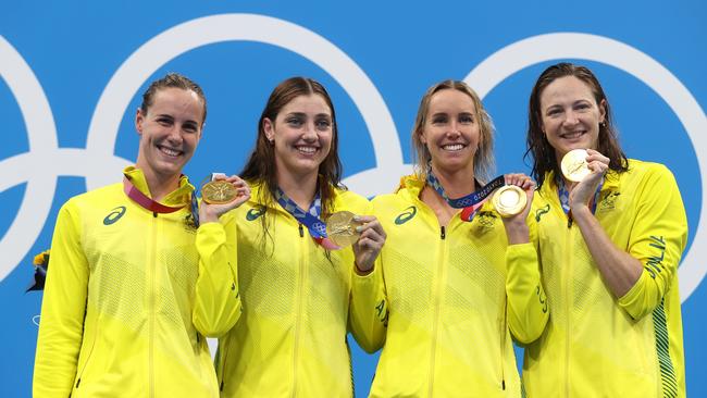 Bronte Campbell, Meg Harris, Emma Mckeon and Cate Campbell after winning gold in the women's 4 x 100m freestyle relay final at the Tokyo 2020 Olympic Games. Picture: Clive Rose/Getty Images