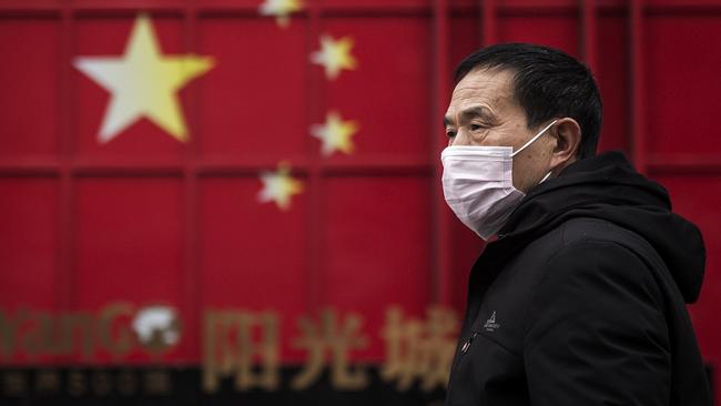 A man wears a protective mask in Wuhan, China. Wuhan is the epicentre of the global health scare. Picture: Getty