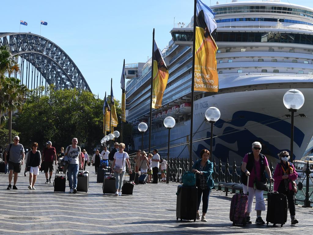 Cruise ship passengers disembark from the Princess Cruises owned Ruby Princess at Circular Quay in Sydney on March 19. Picture: Dean Lewins/AAP