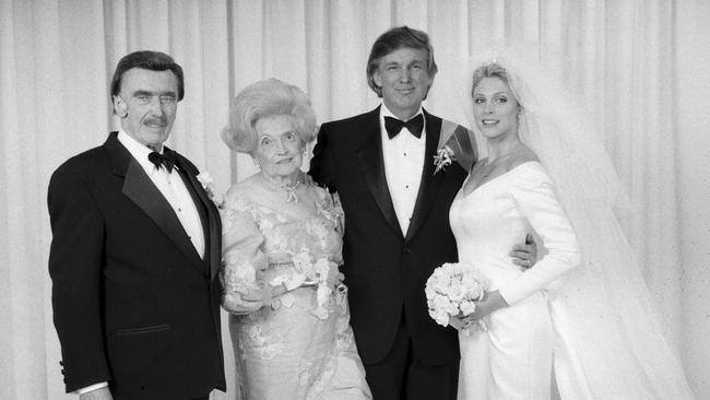 Donald Trump and then wife Marla Maples on their wedding day with Mr Trump’s father, Fred Trump and mother Mary Anne Trump.