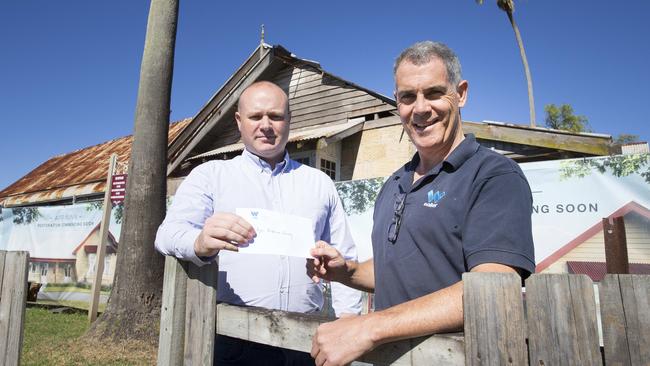 Appin Historical Society’s Aaron Williamson and Walker Corporation development manager Tim Solan at the Appin Inn which will be restored as part of the proposal.