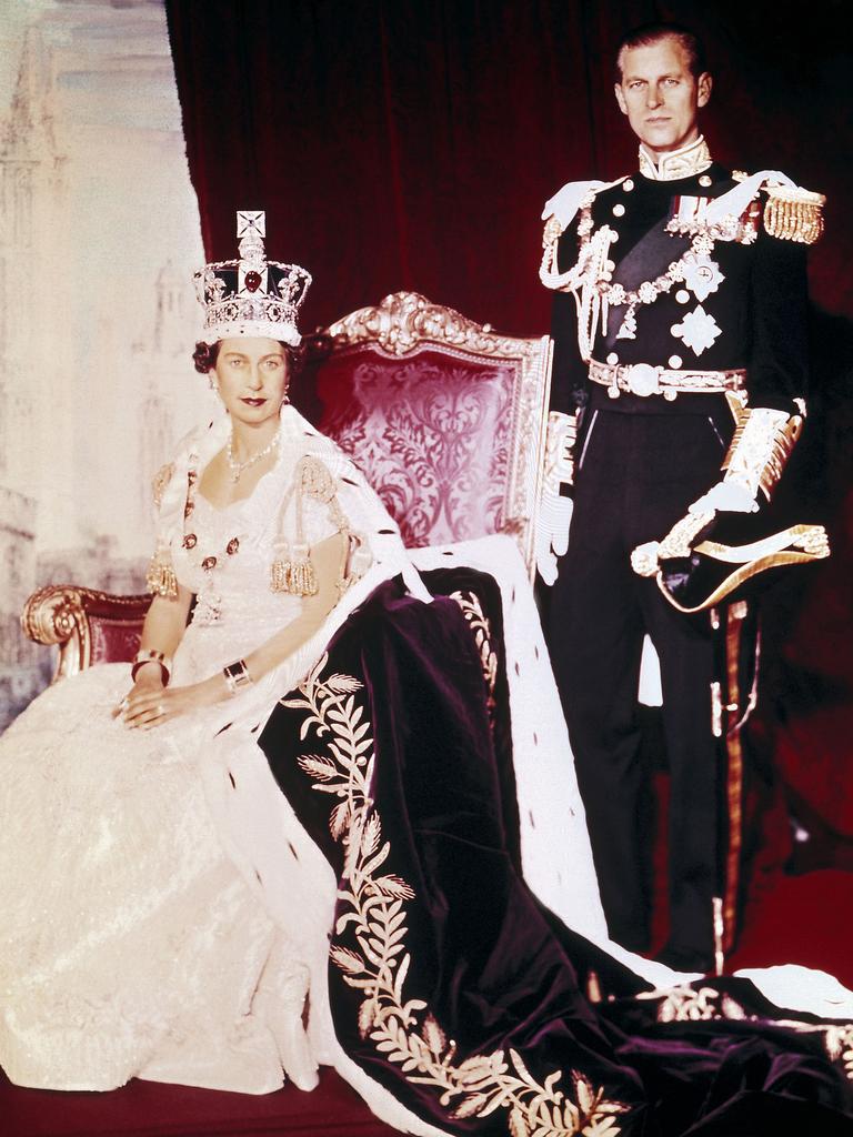 June 2, 1953 shows Britain’s Queen Elizabeth II posing with ther husband Prince Philip on the Queen’s Coronation day at Buckingham Palace, in London. Picture: AFP