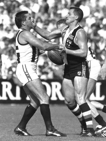 Premiership captain Tony Shaw and the Saints’ Brian Wilson clash in 1991.