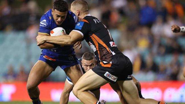 SYDNEY, AUSTRALIA - FEBRUARY 21:  Isaiah Iongi of the Eels is tackled during the 2025 NRL Pre-Season Challenge match between Wests Tigers and Parramatta Eels at Leichhardt Oval on February 21, 2025 in Sydney, Australia. (Photo by Mark Metcalfe/Getty Images)