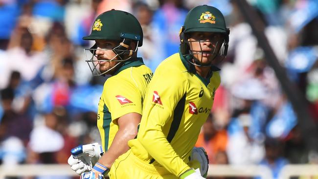 The team only needs one of (L-R) Aaron Finch or Usman Khawaja. Picture: Dibyangshu Sarkar/AFP