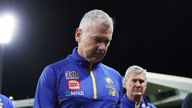 Adam Simpson (centre) is in serious hot water. (Photo by Mark Metcalfe/AFL Photos/via Getty Images )