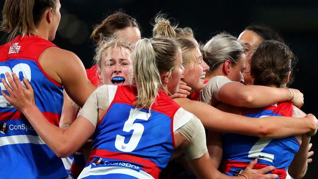 Bulldogs celebrate Ellie Blackburn’s goal against Carlton at Ikon Park. Picture: Kelly Defina/Getty Images