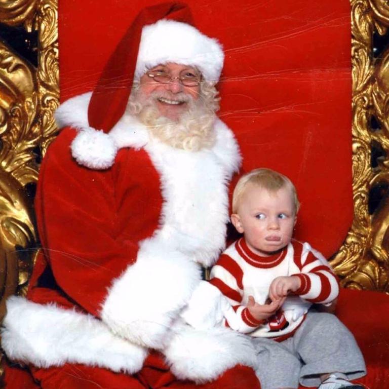 Toddler pictured using sign language while sitting on Santa’s lap ...