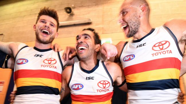 Bryce Gibbs celebrates Adelaide’s win over Melbourne on Saturday night. Gibbs tagged Clayton Oliver in the second half and kept him to 11 touches. Picture: Dan Peled (AAP).