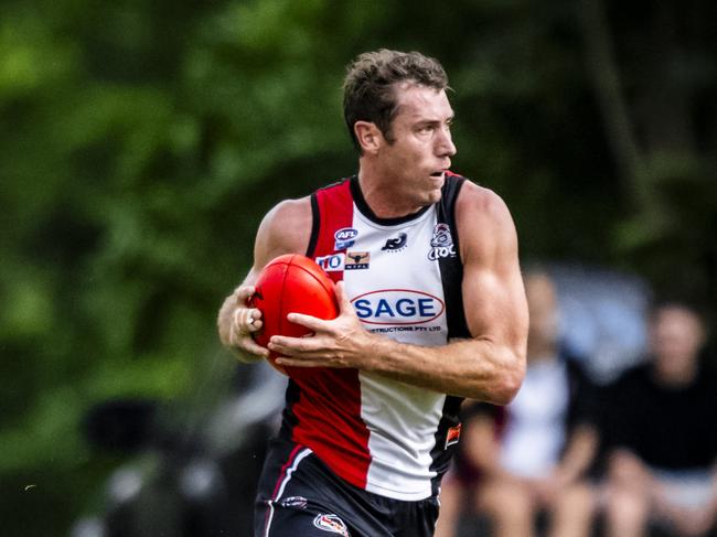 Matt Dennis with ball in hand for Southern Districts in the 2023-24 NTFL season. Picture: Patch Clapp / AFLNT Media