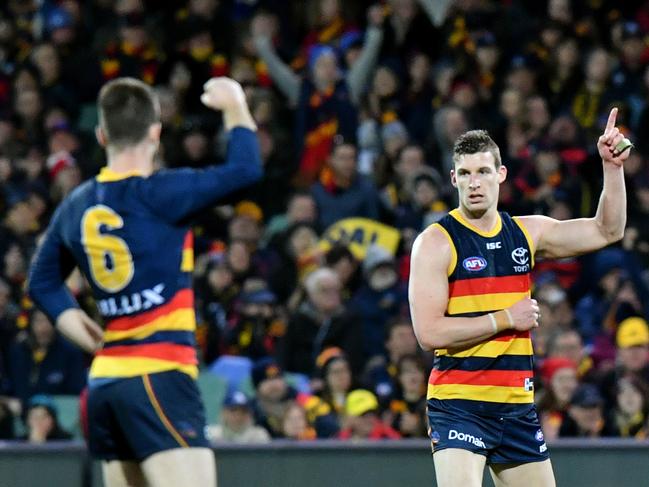 Josh Jenkins of the Crows (right) celebrates after kicking a goal in Round 22 against North Melbourne Kangaroos at Adelaide Oval in 2018. Picture: AAP Image/Kelly Barnes