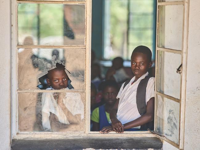 Children attend school in Hwange. The International Foundation for Animal Welfare provides bicycles to those who travel long distances along elephant corridors. Picture: Zinyange Auntony/AFP