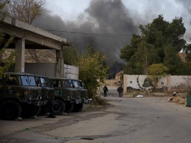 Smoke rises after an IDF strike reportedly targeted ammunition depots near Mezzeh Air Base. Picture: Getty