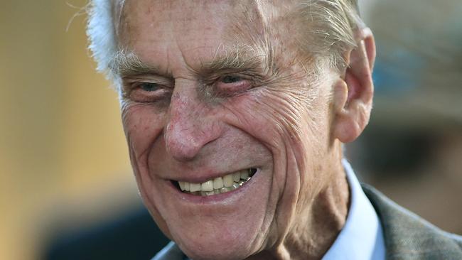 Prince Philip, Duke of Edinburgh, in 2014 smiles as he meets members of the Royal College of Organists to commemorate their 150th anniversary at St. George's Chapel at Windsor Castle. Picture: POOL/AFP