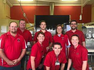 The Kingaroy Bunnings team with some of the Red Ants volunteers in their freshly painted clubhouse. Picture: Kingaroy Bunnings