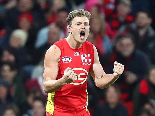 Nick Holman of the Suns celebrates a goal during the round 17 AFL match between the Gold Coast Suns and the Essendon Bombers at Metricon Stadium on July 14, 2018 in Gold Coast, Australia. Picture: Chris Hyde/Getty Images.