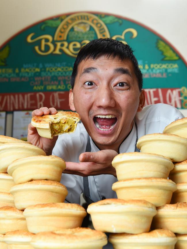 Country Cobb Bakery owner Chan Khun with a heap of his award-winning pies. Picture: Josie Hayden