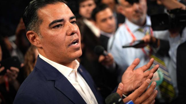 Robert Garcia speaks to reporters in the spin room following the debate. Picture: Getty Images via AFP.