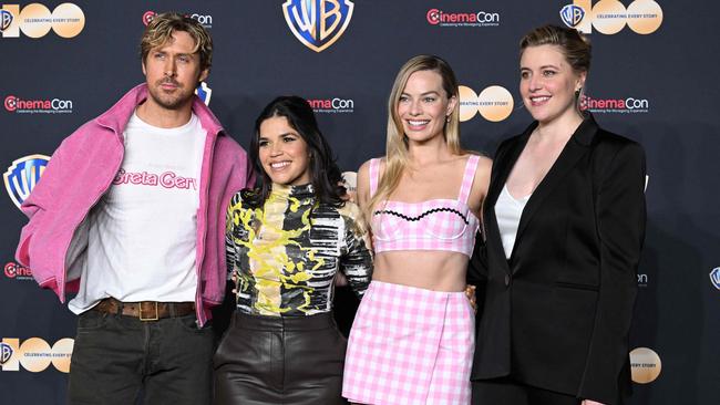 Barbie co-stars Ryan Gosling, America Ferrera and Margot Robbie with director Greta Gerwig in April last year. Picture: Bridget Bennett/AFP