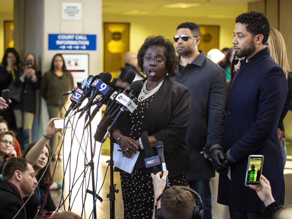 Jussie Smollett, right, and his lawyer Patricia Brown Holmes, speaks to reporters at the Leighton Criminal Courthouse. Picture: Ashlee Rezin/Chicago Sun-Times via AP