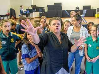 ON SONG: Opera singer Deborah Cheetham tutors local indigenous students in singing as part of a week-long residency at the Clarence Valley Conservatorium in 2016. Ms Cheetham has been critical of the Australian national anthem, refusing to sing it at a grand final because of its absence of indigenous recognition. Picture: Adam Hourigan