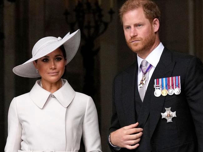 Prince Harry, Duke of Sussex, and Britain's Meghan, Duchess of Sussex, leave at the end of the National Service of Thanksgiving for The Queen's reign in 2022. Picture: AFP