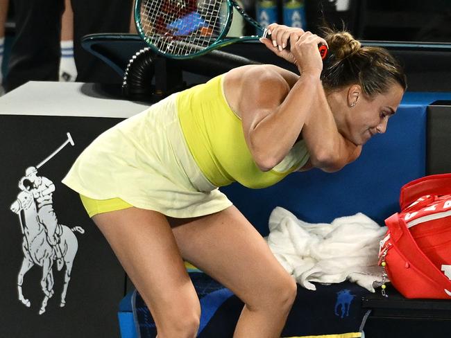 MELBOURNE, AUSTRALIA - JANUARY 25: Aryna Sabalenka throws her smashed racket after her defeat by Madison Keys of the United States in the Women's Singles Finalduring day 14 of the 2025 Australian Open at Melbourne Park on January 25, 2025 in Melbourne, Australia. (Photo by Quinn Rooney/Getty Images)