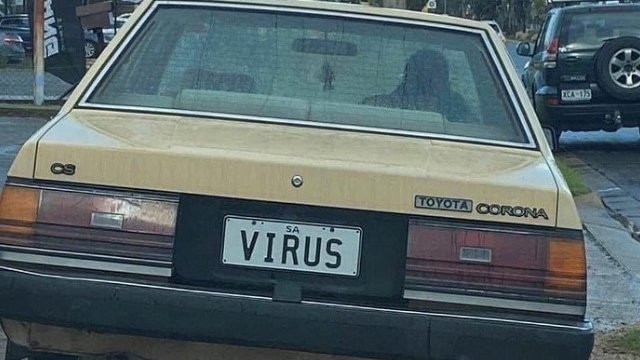 A Toyota Corona with the SA number plate "Virus". Picture: Instagram / Brown Cardigan